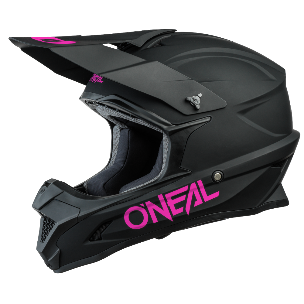 pink and black dirt bike helmet